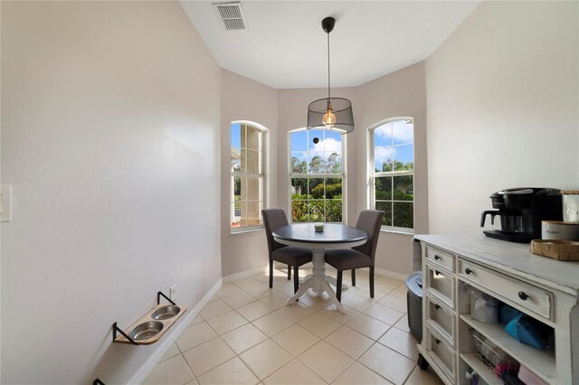 4558 Redmond Pl, Sanford, FL 32771 - dining space with baseboards and light tile patterned floors