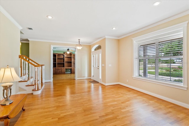 17631 Vista Belle Ct, Montverde, FL 34756 - entryway featuring stairway, light wood-type flooring, baseboards, crown molding, and recessed lighting