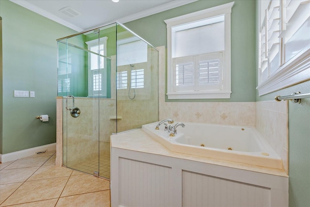17631 Vista Belle Ct, Montverde, FL 34756 - bathroom featuring a stall shower, crown molding, tile patterned flooring, a jetted tub, and baseboards