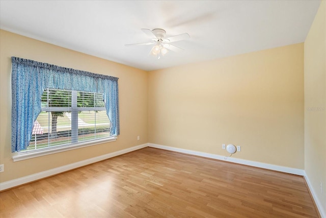 17631 Vista Belle Ct, Montverde, FL 34756 - unfurnished room with wood finished floors, baseboards, and ceiling fan