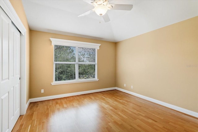 17631 Vista Belle Ct, Montverde, FL 34756 - unfurnished bedroom with a closet, light wood-style floors, and baseboards