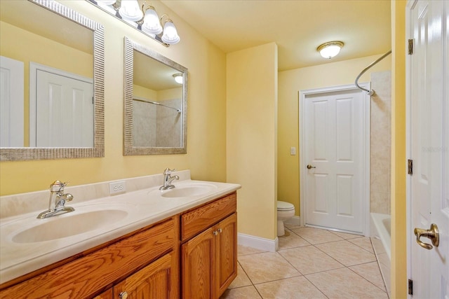17631 Vista Belle Ct, Montverde, FL 34756 - bathroom featuring tile patterned floors, toilet, double vanity, baseboards, and shower / tub combination