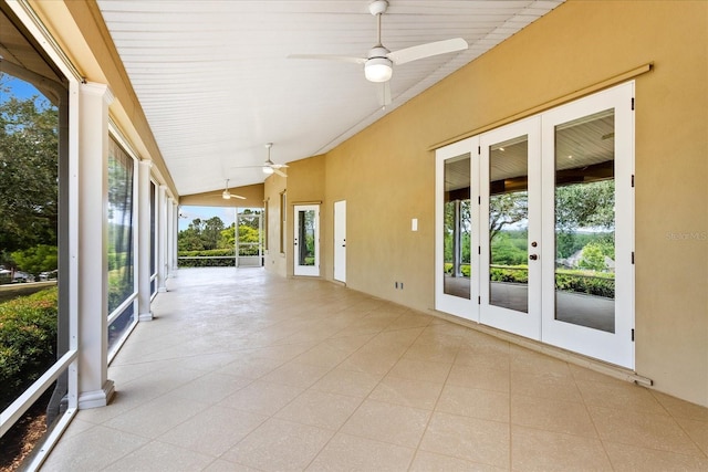 17631 Vista Belle Ct, Montverde, FL 34756 - unfurnished sunroom with french doors and lofted ceiling
