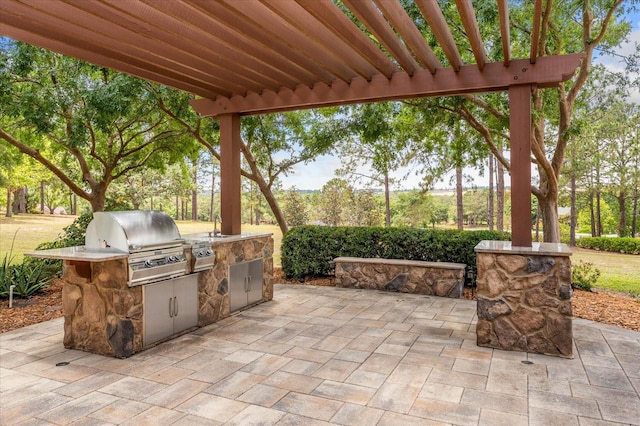 17631 Vista Belle Ct, Montverde, FL 34756 - view of patio with exterior kitchen and area for grilling