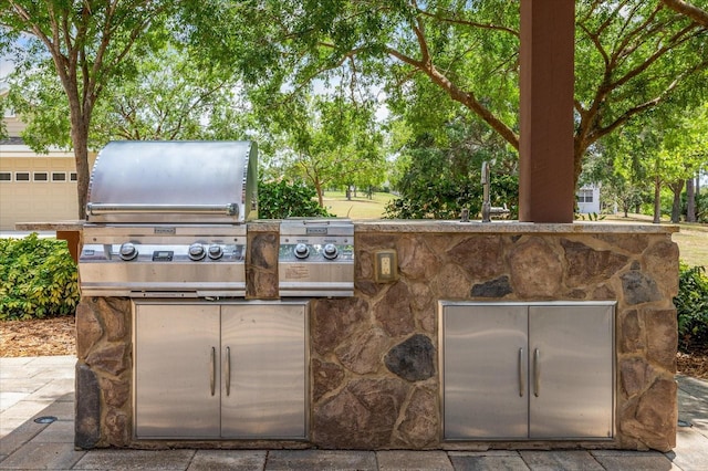 17631 Vista Belle Ct, Montverde, FL 34756 - view of patio featuring a grill and area for grilling