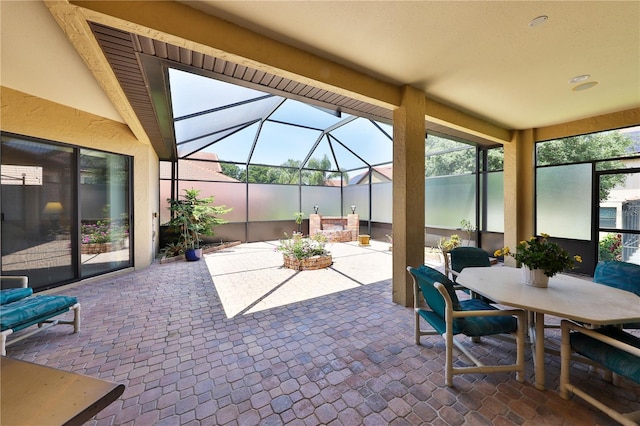 2921 Falconhill Dr, Apopka, FL 32712 - view of patio featuring glass enclosure and outdoor dining space