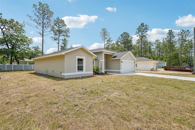 13881 SW 80th Ave, Ocala, FL 34473 - view of front of home featuring stucco siding, driveway, and a garage