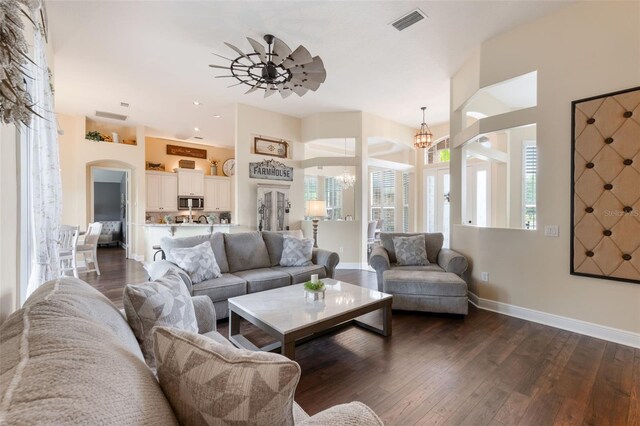 441 Hightower Dr, Debary, FL 32713 - living area with a chandelier, dark wood-type flooring, baseboards, a ceiling fan, and recessed lighting