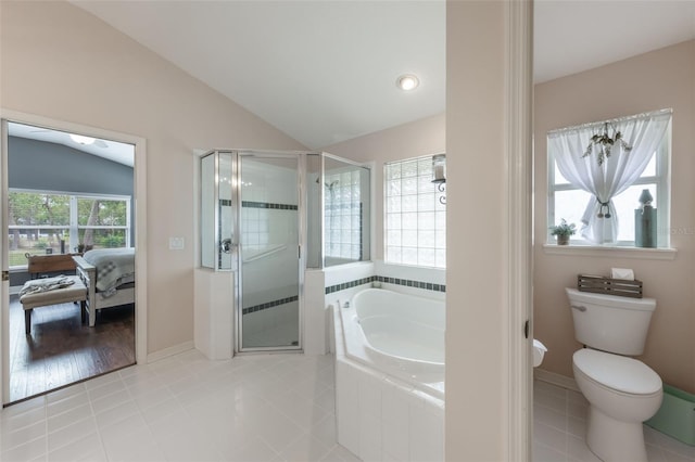 441 Hightower Dr, Debary, FL 32713 - bathroom featuring tile patterned floors, a stall shower, lofted ceiling, a garden tub, and toilet