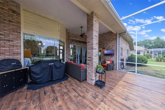 441 Hightower Dr, Debary, FL 32713 - view of patio / terrace featuring a grill, ceiling fan, an outdoor hangout area, glass enclosure, and a deck