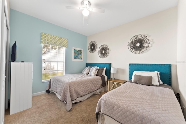 1596 Moon Valley Dr, Davenport, FL 33896 - bedroom featuring carpet, baseboards, and a ceiling fan