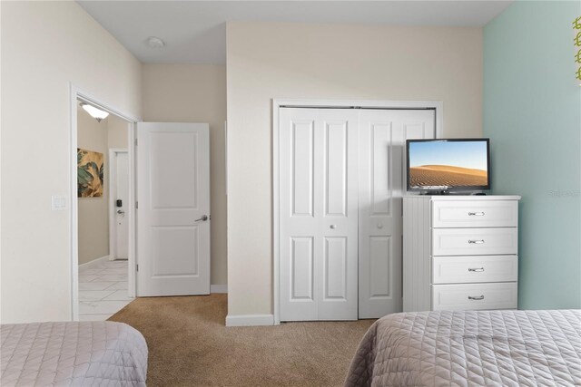 1596 Moon Valley Dr, Davenport, FL 33896 - carpeted bedroom with a closet and baseboards