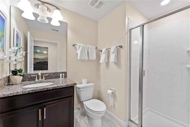 1596 Moon Valley Dr, Davenport, FL 33896 - bathroom featuring toilet, a stall shower, vanity, and baseboards
