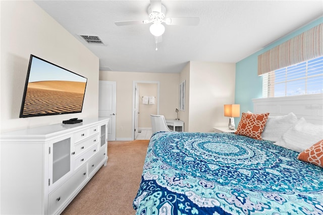 1596 Moon Valley Dr, Davenport, FL 33896 - bedroom featuring light carpet, baseboards, ceiling fan, and a textured ceiling