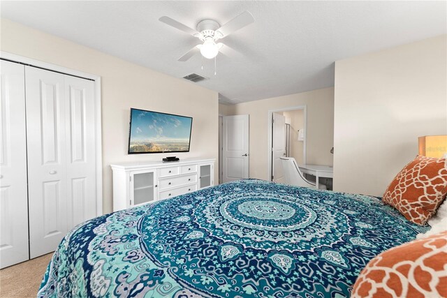 1596 Moon Valley Dr, Davenport, FL 33896 - bedroom with carpet flooring, a closet, and ceiling fan