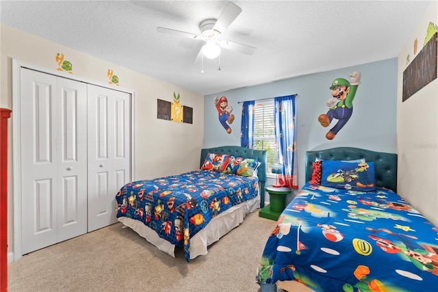 1596 Moon Valley Dr, Davenport, FL 33896 - carpeted bedroom with a closet, a textured ceiling, and ceiling fan