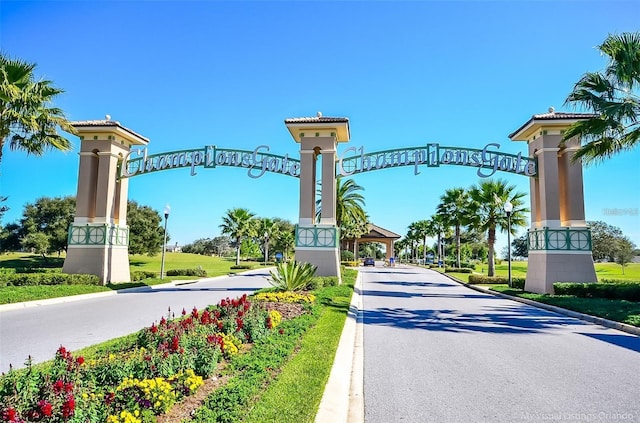 1596 Moon Valley Dr, Davenport, FL 33896 - view of asphalt street with curbs and street lights