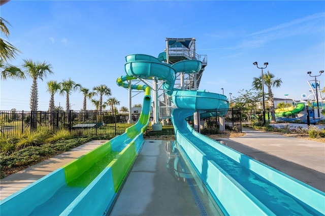 1596 Moon Valley Dr, Davenport, FL 33896 - communal playground featuring fence