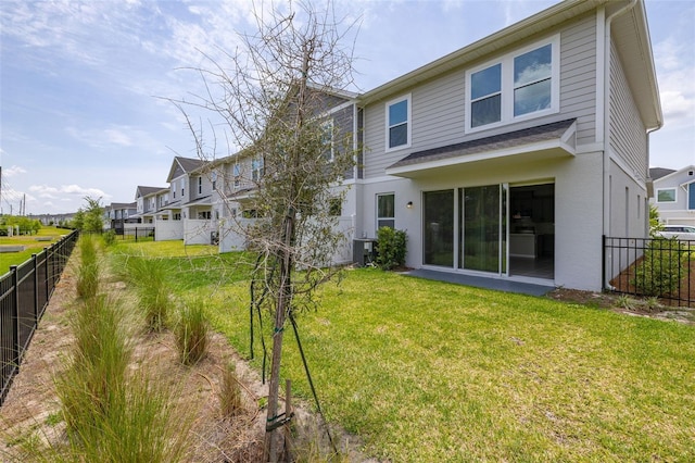 1915 Terrapin Rd, Ocoee, FL 34761 - back of house featuring a residential view and central AC