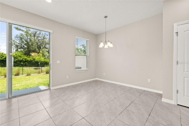 1915 Terrapin Rd, Ocoee, FL 34761 - unfurnished room featuring a chandelier, light tile patterned floors, and baseboards