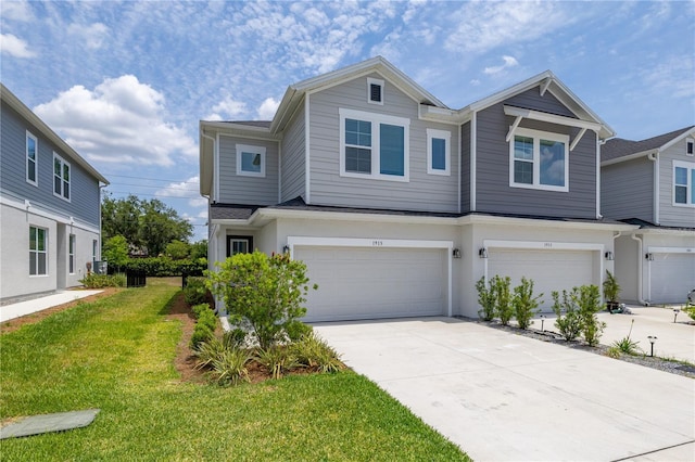 1915 Terrapin Rd, Ocoee, FL 34761 - multi unit property with an attached garage, a front yard, and driveway