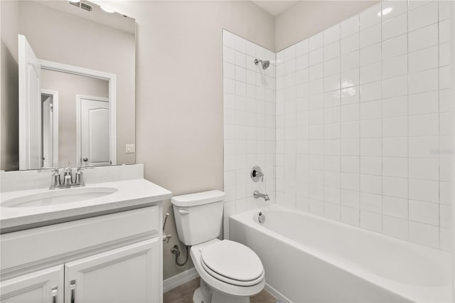 1915 Terrapin Rd, Ocoee, FL 34761 - full bathroom featuring toilet, bathtub / shower combination, vanity, and baseboards