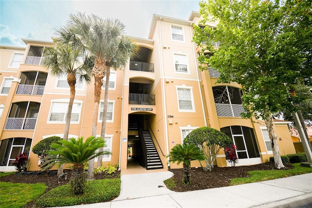 2788 Almaton Loop Unit 202, Kissimmee, FL 34747 - view of apartment building / complex with stairs