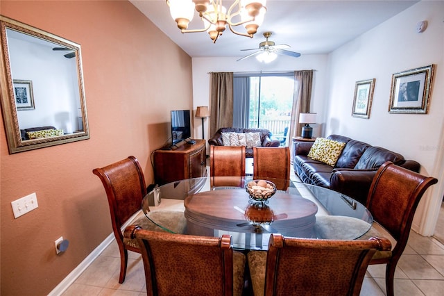 2788 Almaton Loop Unit 202, Kissimmee, FL 34747 - dining space with light tile patterned floors, a chandelier, baseboards, and ceiling fan