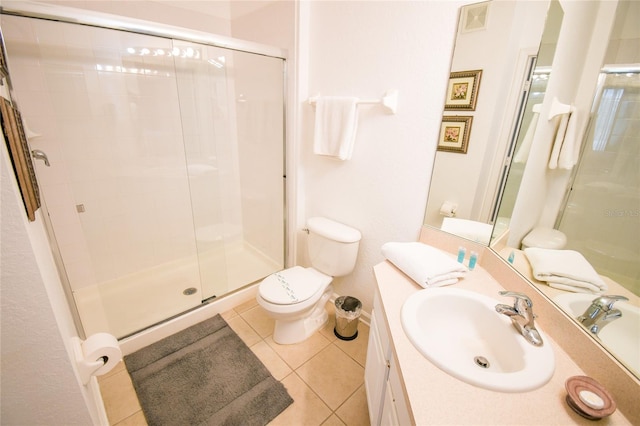 2788 Almaton Loop Unit 202, Kissimmee, FL 34747 - full bathroom featuring tile patterned floors, a shower stall, toilet, and vanity