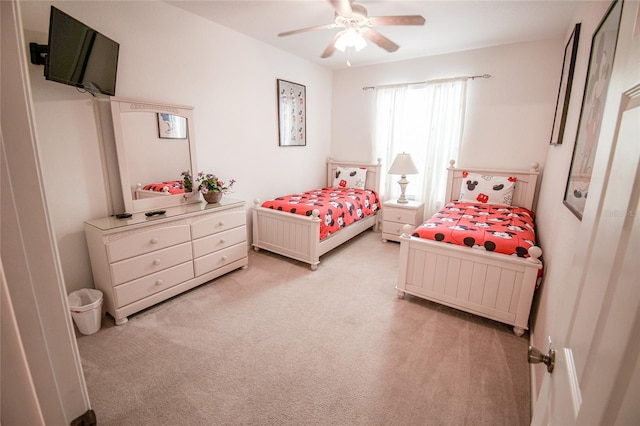2788 Almaton Loop Unit 202, Kissimmee, FL 34747 - bedroom with light colored carpet and a ceiling fan