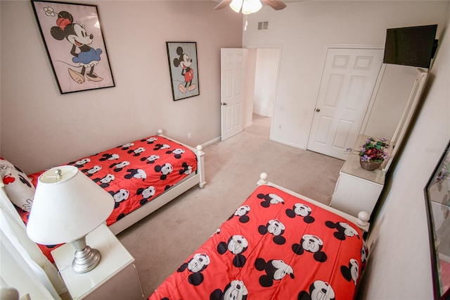 2788 Almaton Loop Unit 202, Kissimmee, FL 34747 - carpeted bedroom featuring a ceiling fan and baseboards