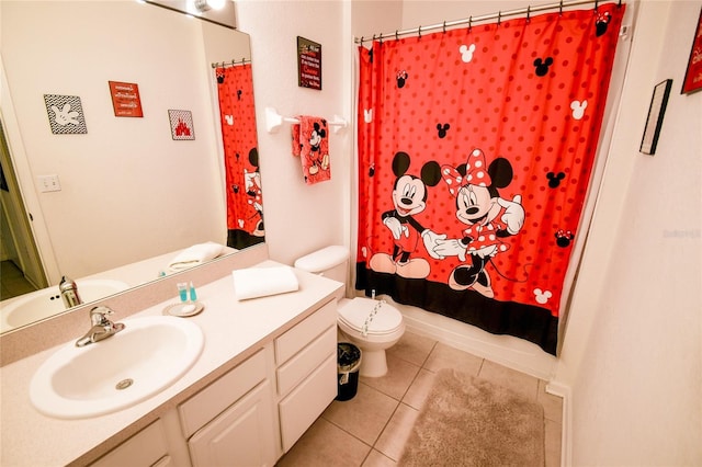 2788 Almaton Loop Unit 202, Kissimmee, FL 34747 - bathroom with tile patterned floors, vanity, toilet, and shower / tub combo with curtain