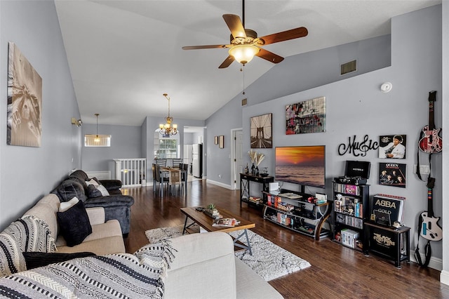 425 Eagle Ridge Dr Unit 425, Davenport, FL 33837 - living area with a ceiling fan, lofted ceiling, wood finished floors, a chandelier, and baseboards
