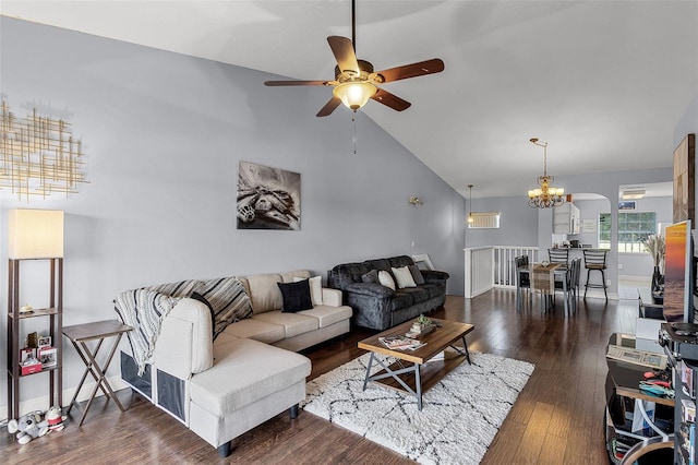 425 Eagle Ridge Dr Unit 425, Davenport, FL 33837 - living area featuring a ceiling fan, a chandelier, dark wood finished floors, high vaulted ceiling, and baseboards