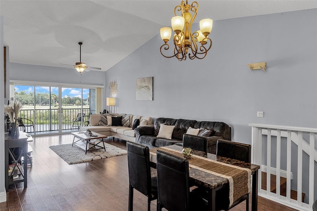 425 Eagle Ridge Dr Unit 425, Davenport, FL 33837 - dining space featuring a chandelier, a ceiling fan, dark wood finished floors, and high vaulted ceiling