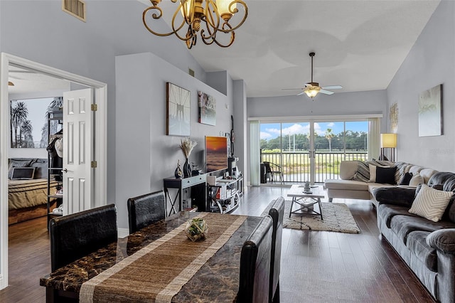 425 Eagle Ridge Dr Unit 425, Davenport, FL 33837 - living room featuring a chandelier, wood finished floors, ceiling fan, and high vaulted ceiling
