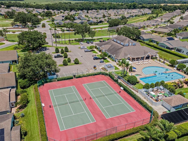 425 Eagle Ridge Dr Unit 425, Davenport, FL 33837 - aerial perspective of suburban area featuring a pool area