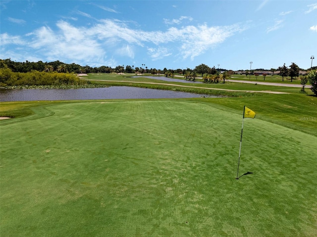 425 Eagle Ridge Dr Unit 425, Davenport, FL 33837 - surrounding community with a water view, view of golf course, and a yard