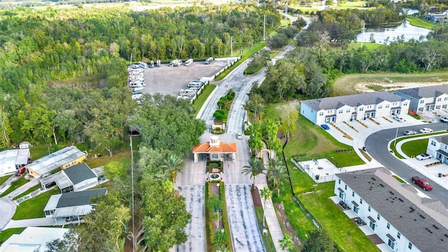 425 Eagle Ridge Dr Unit 425, Davenport, FL 33837 - aerial view of property and surrounding area featuring a nearby body of water