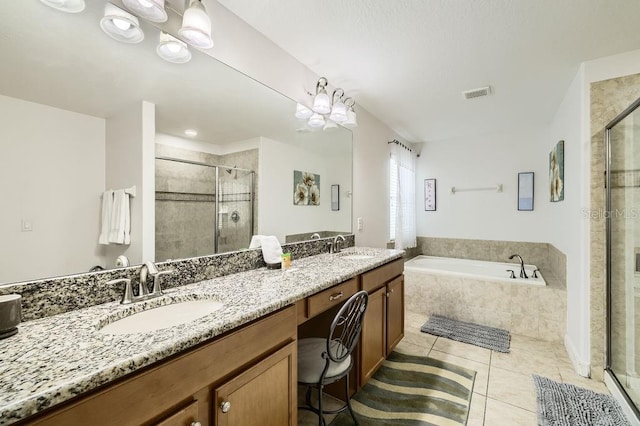 full bath featuring a stall shower, a garden tub, tile patterned flooring, and double vanity