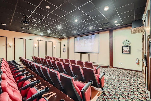cinema featuring carpet and baseboards
