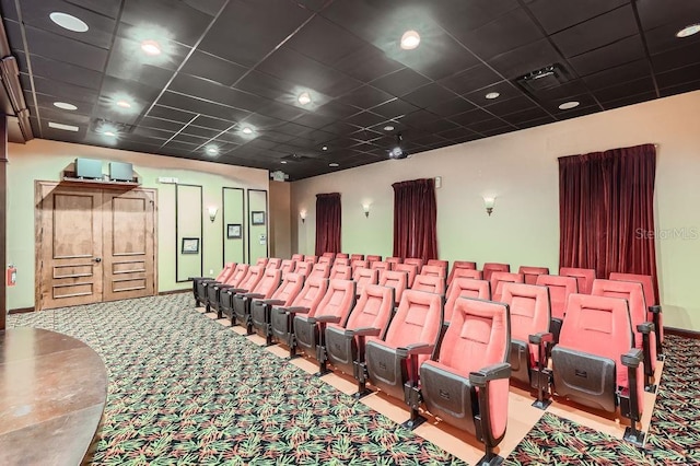 home theater room featuring carpet flooring