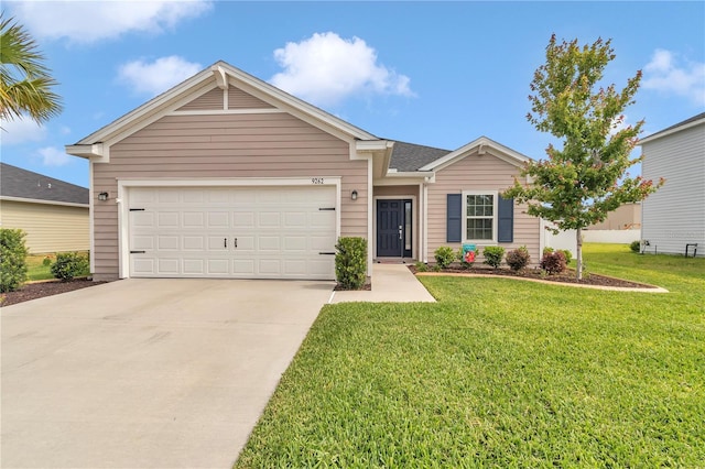 ranch-style house with concrete driveway, a front yard, and a garage