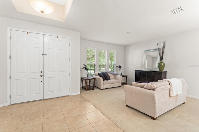 2827 Park Meadow Dr, Apopka, FL 32703 - living room featuring baseboards and light tile patterned floors