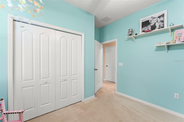 2827 Park Meadow Dr, Apopka, FL 32703 - unfurnished bedroom with light colored carpet and a closet
