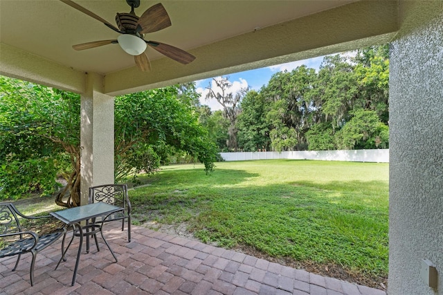 2827 Park Meadow Dr, Apopka, FL 32703 - view of patio featuring a ceiling fan and view of scattered trees