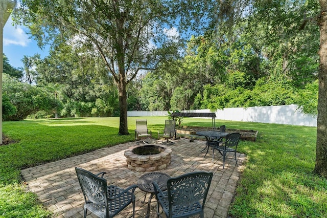 2827 Park Meadow Dr, Apopka, FL 32703 - view of patio with a fire pit