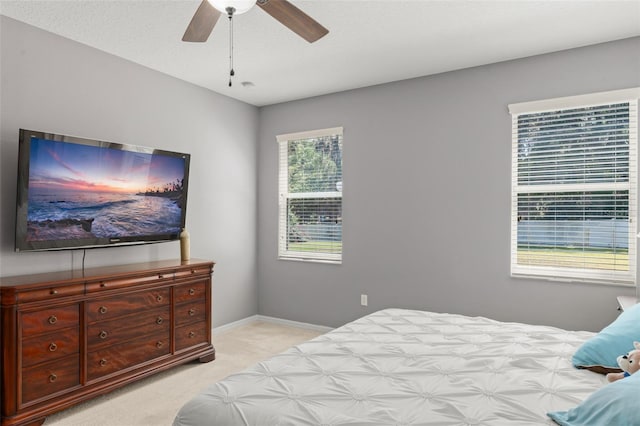 2827 Park Meadow Dr, Apopka, FL 32703 - bedroom featuring light carpet and a ceiling fan