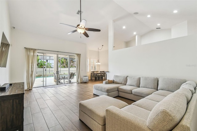 14003 Sobrado Dr, Orlando, FL 32837 - living area with a ceiling fan, high vaulted ceiling, recessed lighting, and wood finished floors