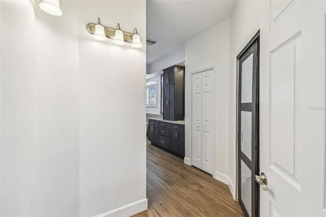 14003 Sobrado Dr, Orlando, FL 32837 - hall with wood finished floors and baseboards